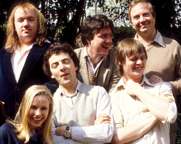 John Lloyd (bottom right) with the cast of Not The Nine O'Clock News and director Bill Wilson